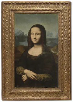 A version of the Mona Lisa in a golden frame.