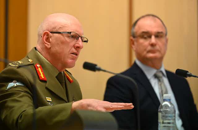 Commander Defence COVID-19 Task Force Lieutenant General John Frewen speaks during a Senate inquiry at Parliament House in Canberra.