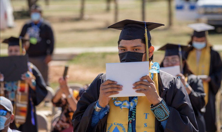 Commencement ceremony at DinÃ© College in May 2021
