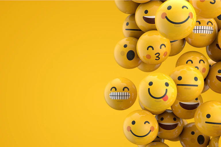 A group of emojis floating in the air.