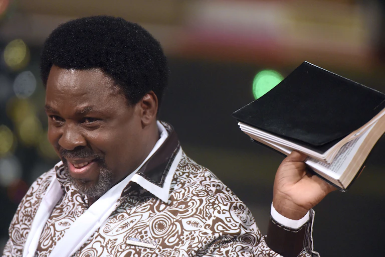 A man holding a bible.