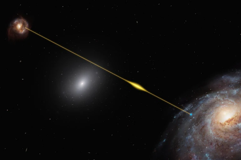 Two galaxies in space with a line drawn between them representing a fast radio burst.