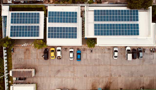 rooftop solar panels and parked cars