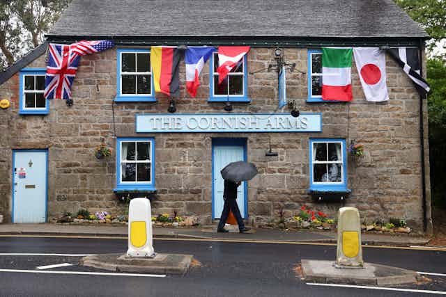 Cornish Arms pub with G7 flags hanging outside