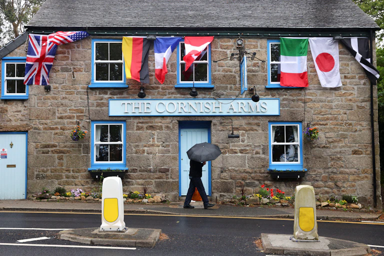 Cornish Arms pub with G7 flags hanging outside