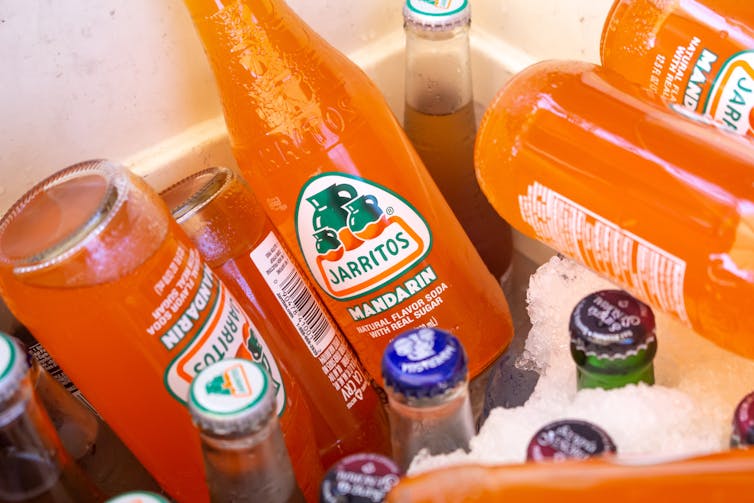 Orange sodas from Mexio in esky.