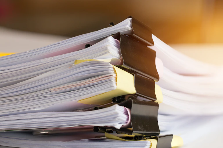 A stack of documents.