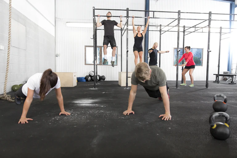 People workout at a gym.