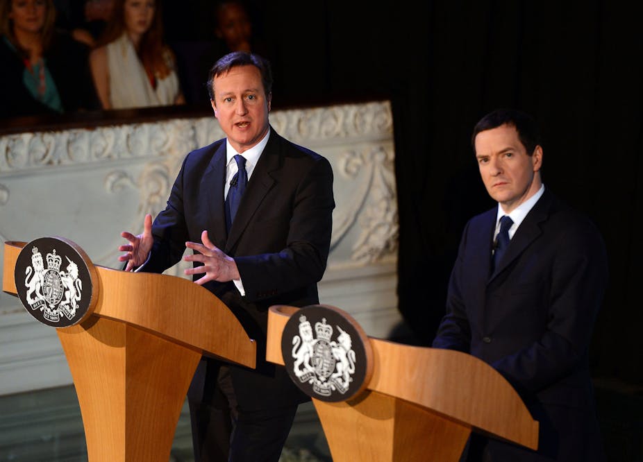 David Cameron and George Osborne giving a speech. 