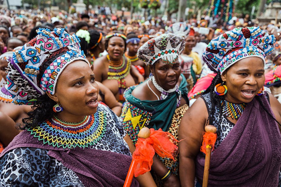 Hundreds of women dressed in Zulu attires at a march.