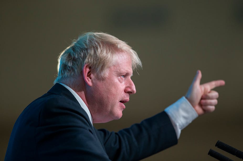 Boris Johnson pointing upwards