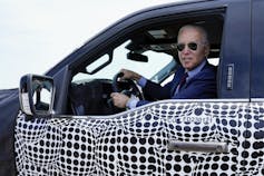 Biden at the wheel of an electric F-150.