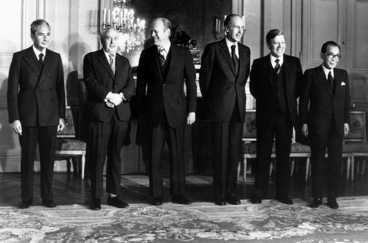 Leaders of the U.S., U.K., France, West Germany, Japan and Italy pose for a picture during a meeting of the then-G-6 in 1975.