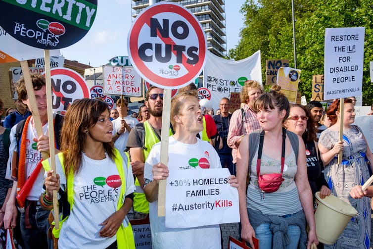 Protests marching against austerity in Bristol.