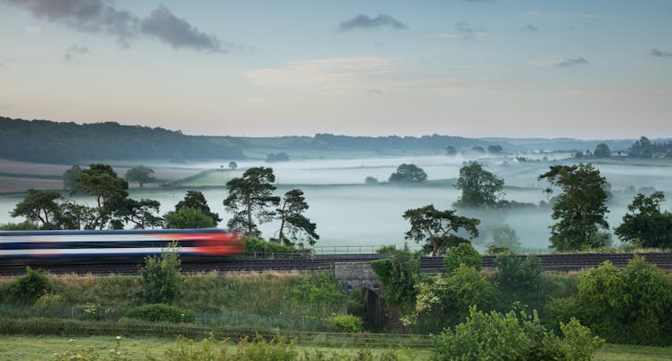 The London to Exeter service speeds through a misty Somerset landscape