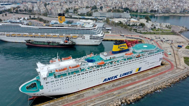 Two large cruise ships anchored at Piraeus port in Greece