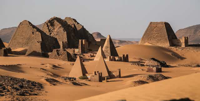 Pyramids on sand dunes