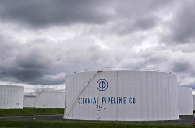 Storage tanks with COLONIAL PIPELINE CO written on them