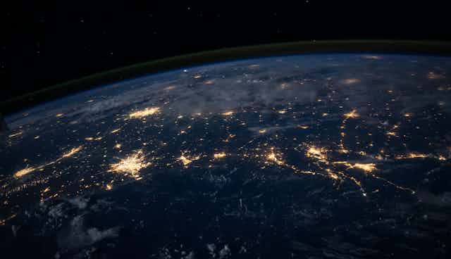 A shot of Earth from above at night.