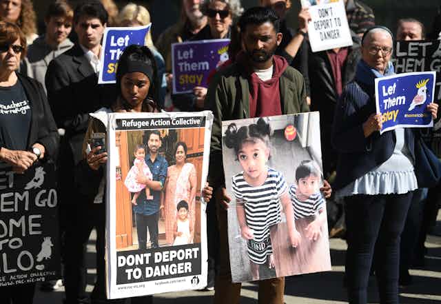 Refugee advocates protest to let the Biloela Tamil family stay in Australia. 
