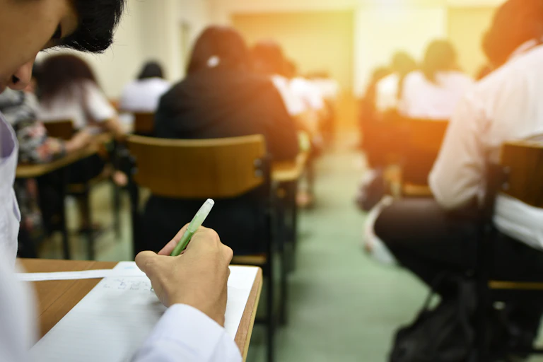 Students sitting exam.