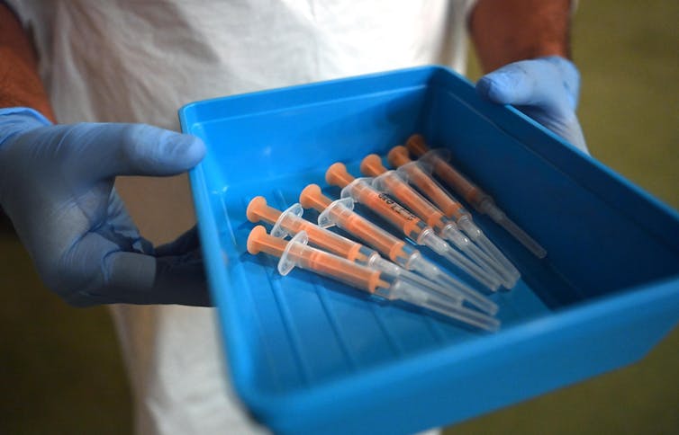 A tray of syringes