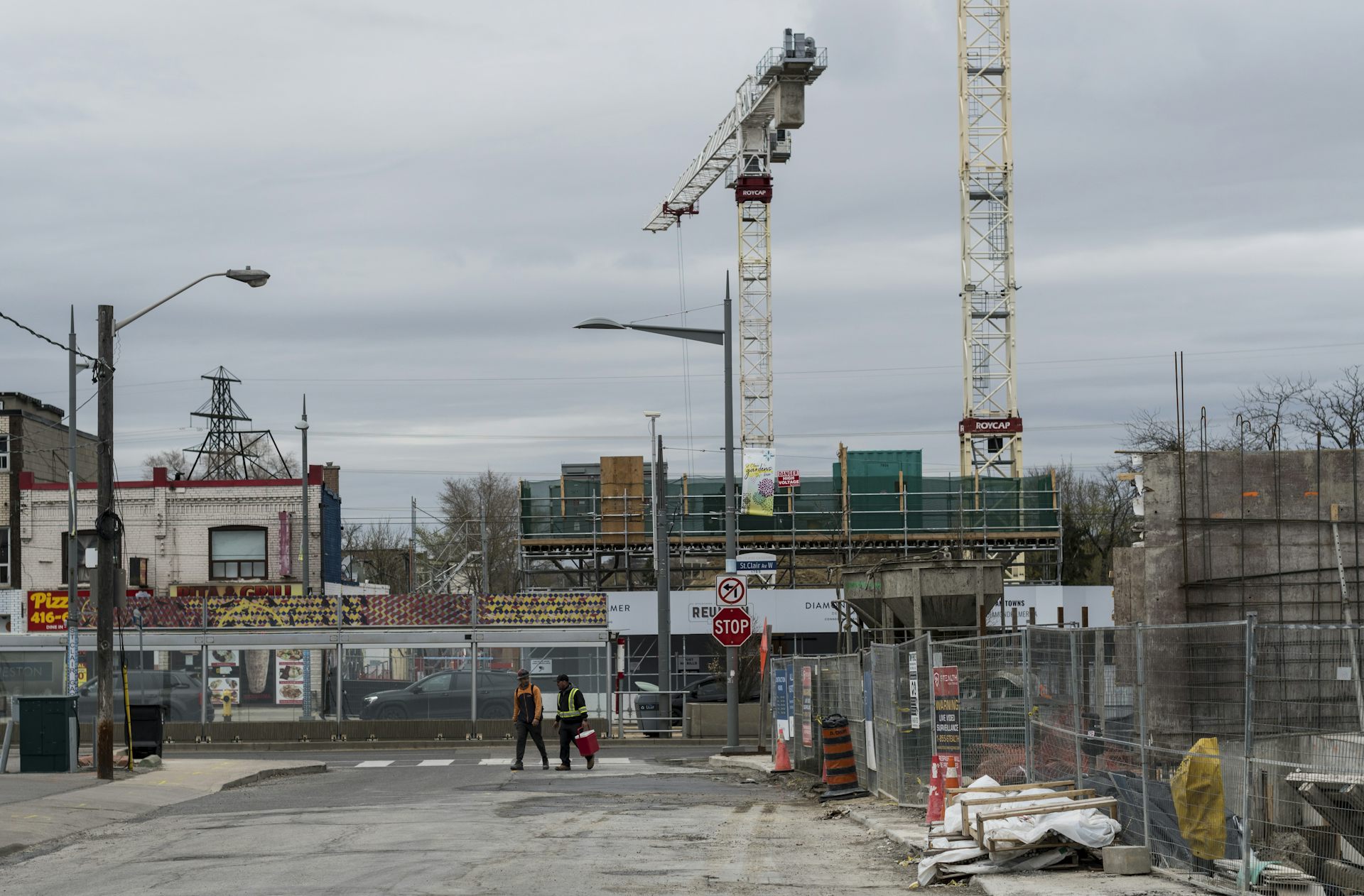 Construction site, 2 large cranes in the background