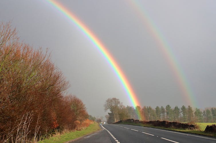 A double rainbow over a motorway