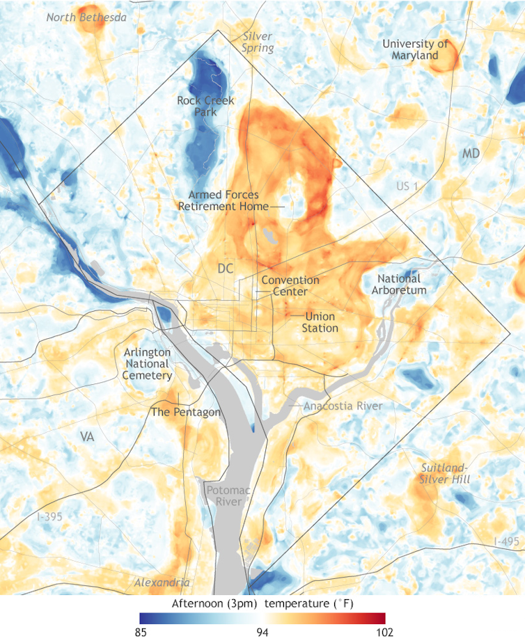 A map of Washington, D.C., and some of its suburbs showing heat islands on downtown areas.