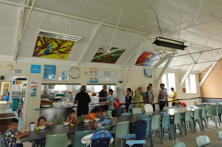 Refugees having lunch at the refugee centre in Auckland