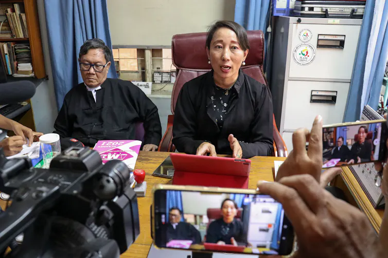 Aung San Suu Kyi's lawyers, Khine Maung Zaw (L) and Daw Min Min Soe (R) at a press conference in the capital Naypyitaw, Myanmar, May 2021.