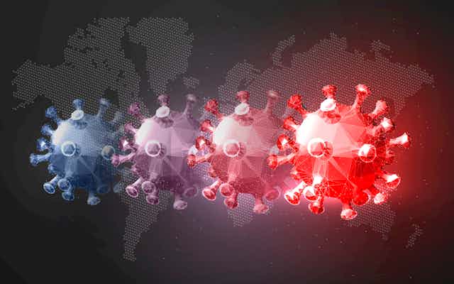 Illustration of coronaviruses against a world map