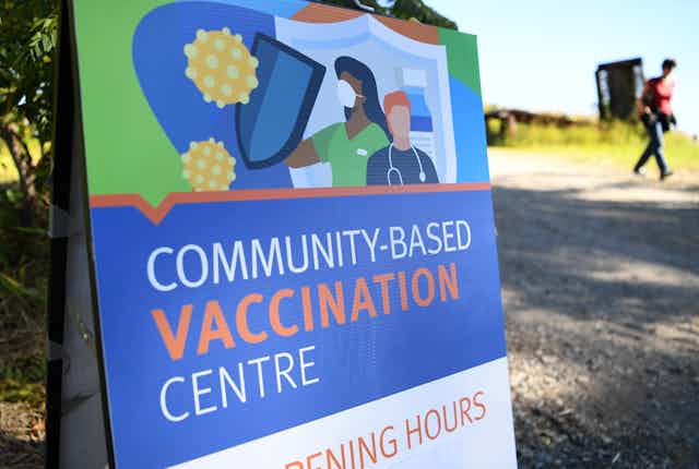 Sign for community vaccination centre