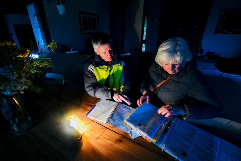 man and woman in dark room