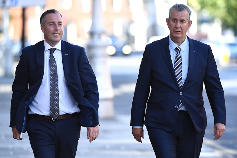 Newly confirmed Northern Ireland first minister Paul Given walking alongside the then leader of the Democratic Unionist Party, Edwin Poots in Dublin, Ireland June 3, 2021.