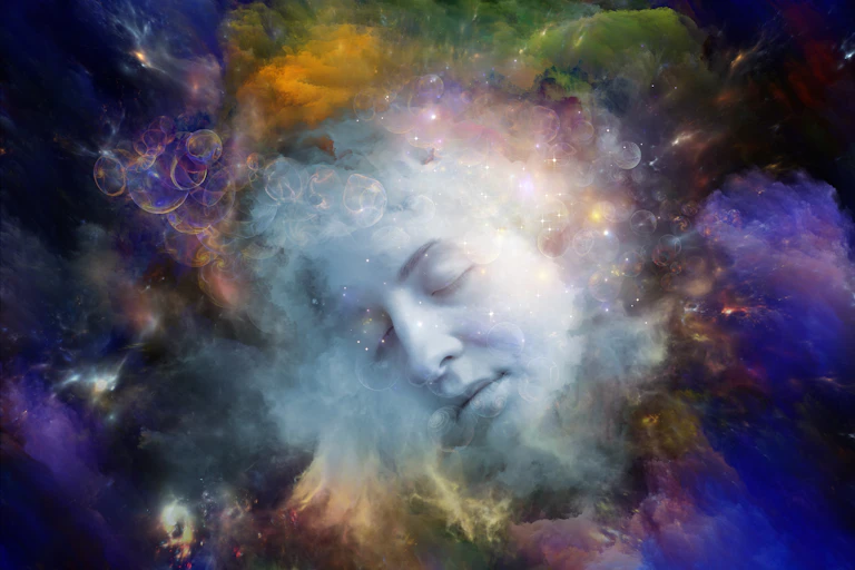 Artist's concept of colourful clouds with a face in the centre.