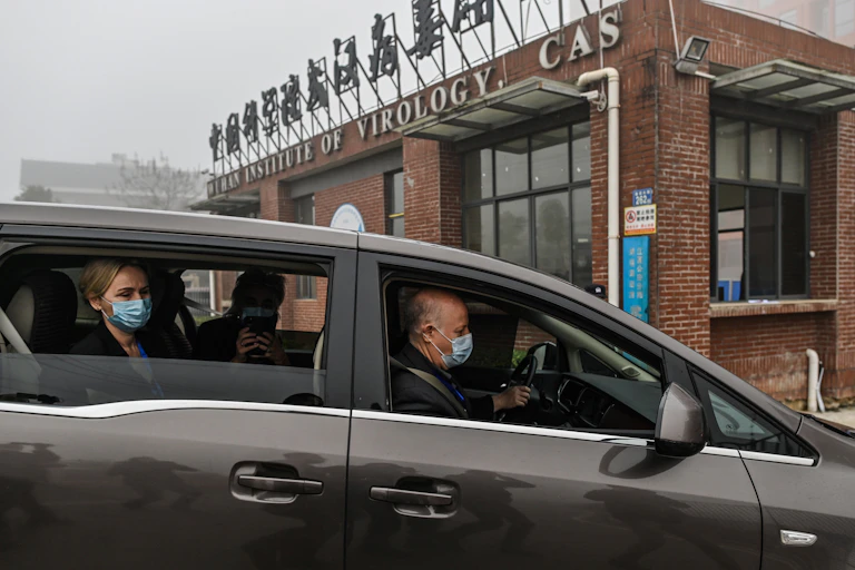 A car with 3 World Health Organization investigators driving up to the Wuhan Institute of Virology in Wuhan China on February 3, 2021.