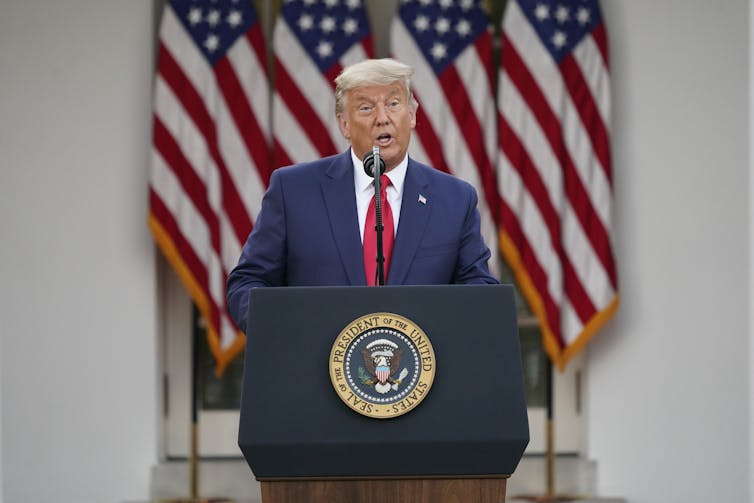 Donald Trump speaking at a press conference