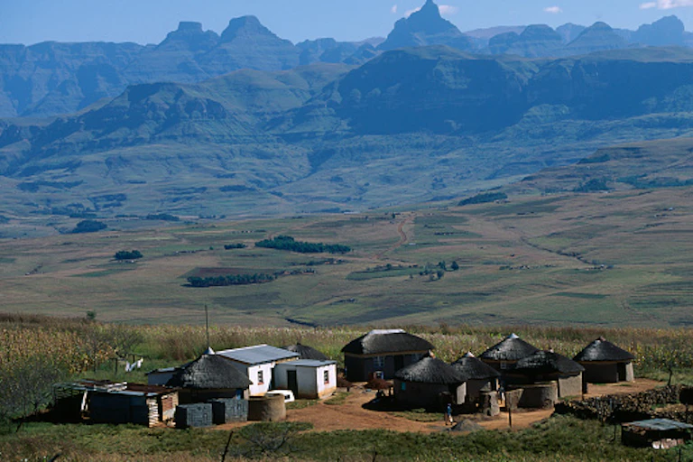 A homestead of mainly thatch-roofed rondavels in rural KwaZulu-Natal