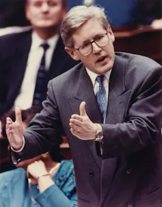 Bob Rae gestures in the Ontario legislature.