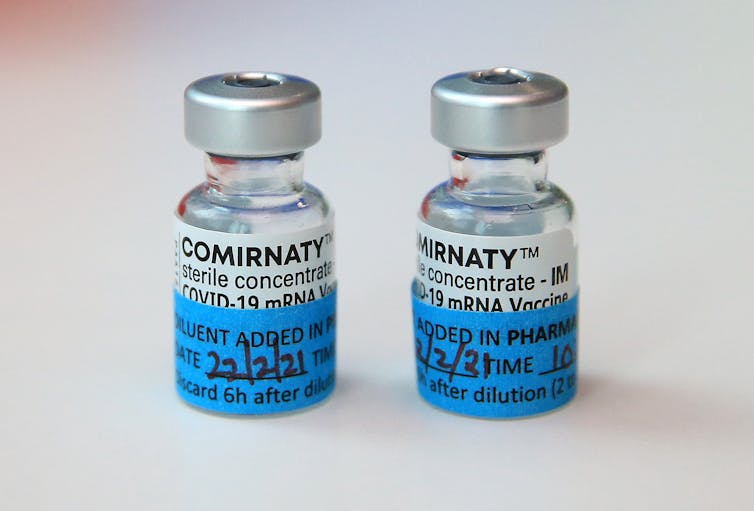 Two vials of the Pfizer vaccine.