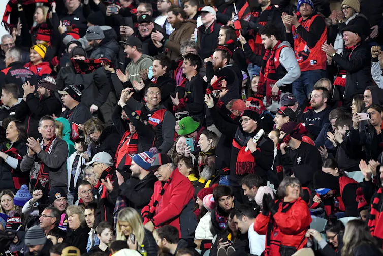Spectators at the AFL match between the Hawthorn Hawks and Essendon Bombers at University of Tasmania Stadium in Launceston, Sunday, June 20 2021.