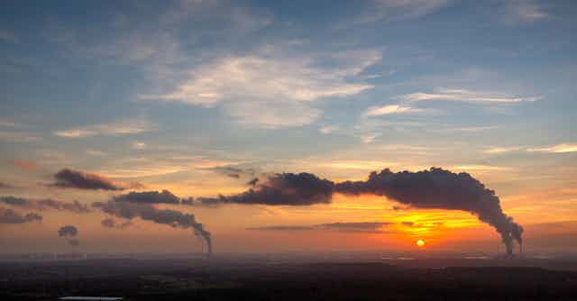 Industrial emissions at sunset