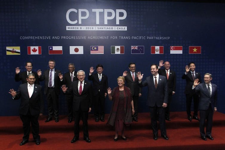The original signatories of the CPTPP pose in Santiago, March 2018