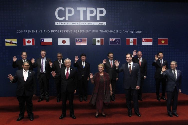The original signatories of the CPTPP pose in Santiago, March 2018