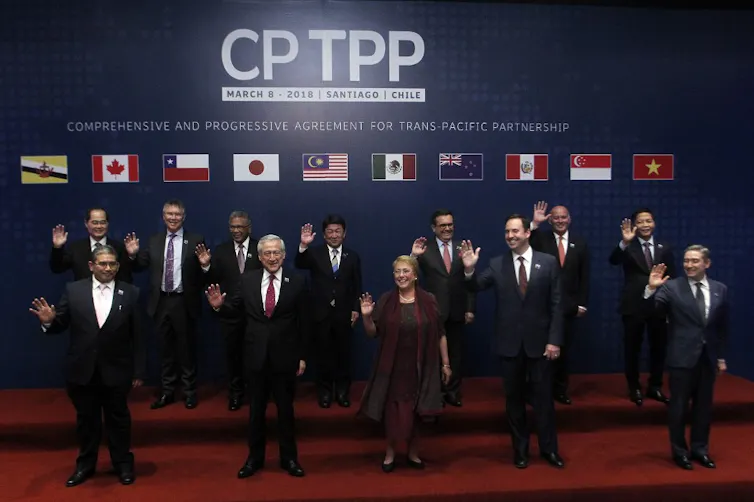 The original signatories of the CPTPP pose in Santiago, March 2018