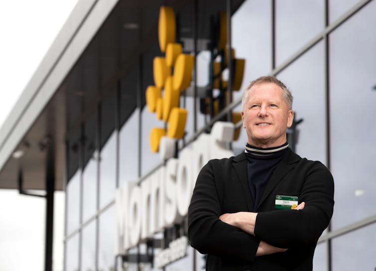 David Potts, Morrisons chief executive, standing outside one of his stores