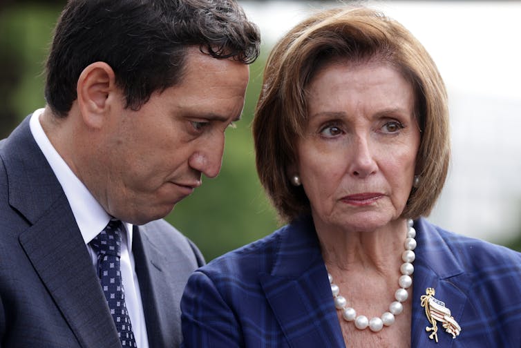 Democratic House Speaker and Texas Democratic lawmaker Trey Martinez Fischer in serious conversation.