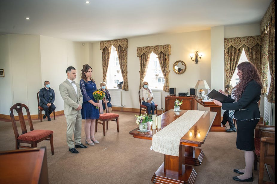 Couple getting married in register office in socially distanced ceremony due to COVID-19