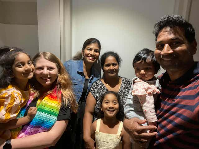 Family of four from Biloela Priya, Nades, Kopika and Tharni Murugappan with family friends and supporters